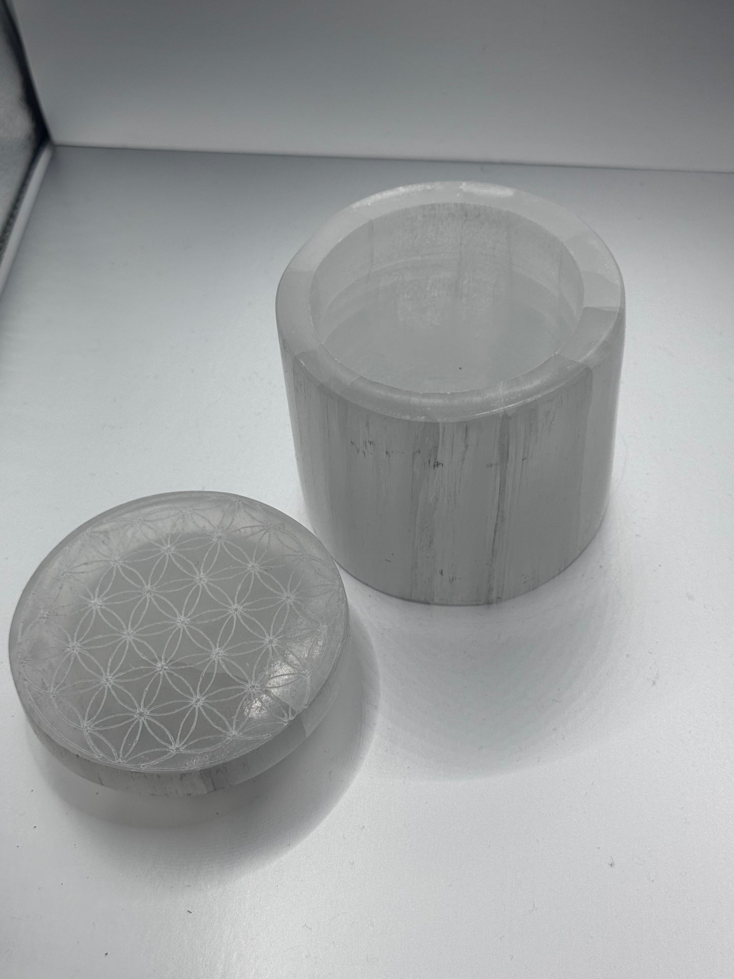 Selenite polished engraved jar with lid.