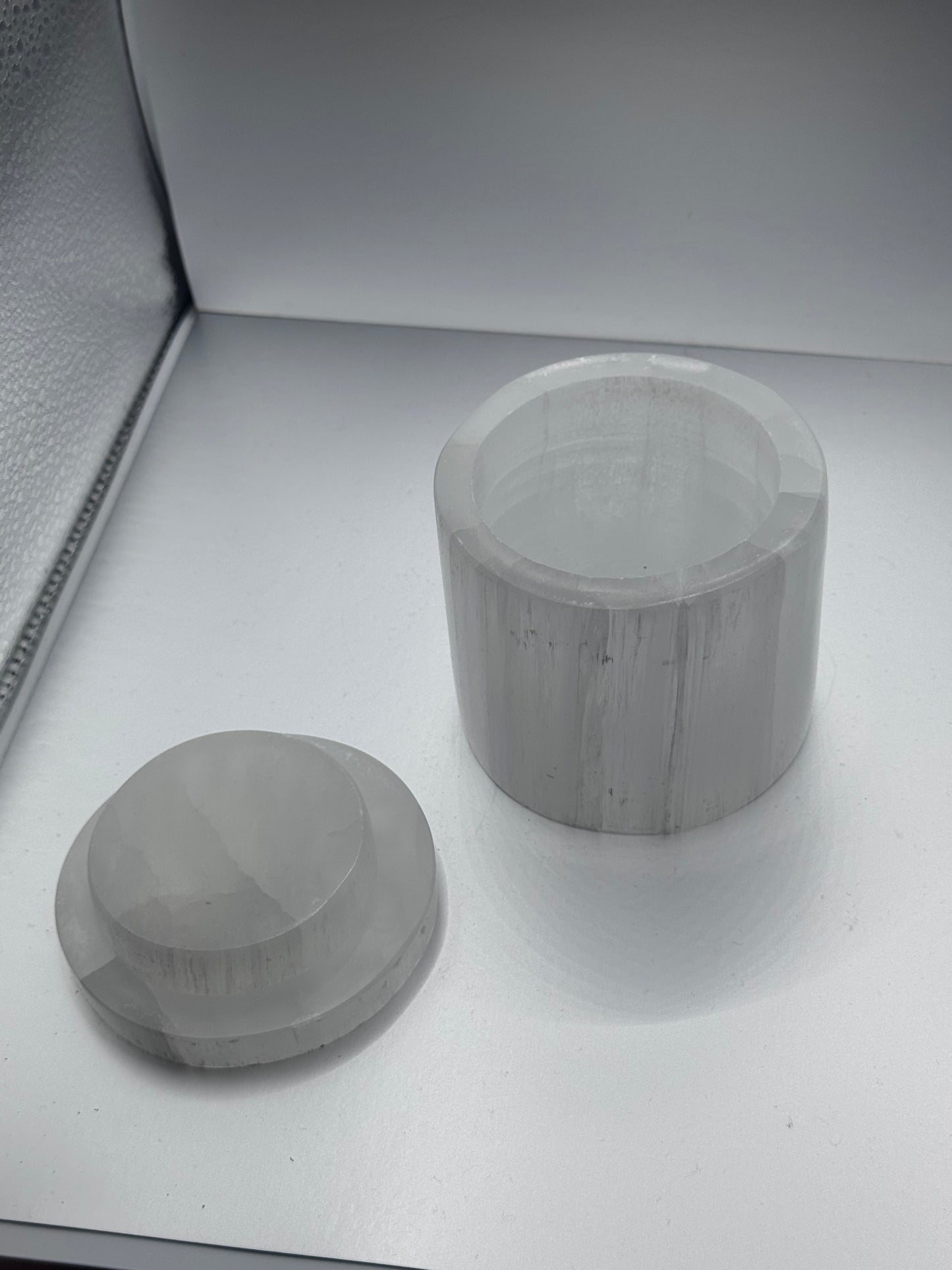 Selenite polished engraved jar with lid.